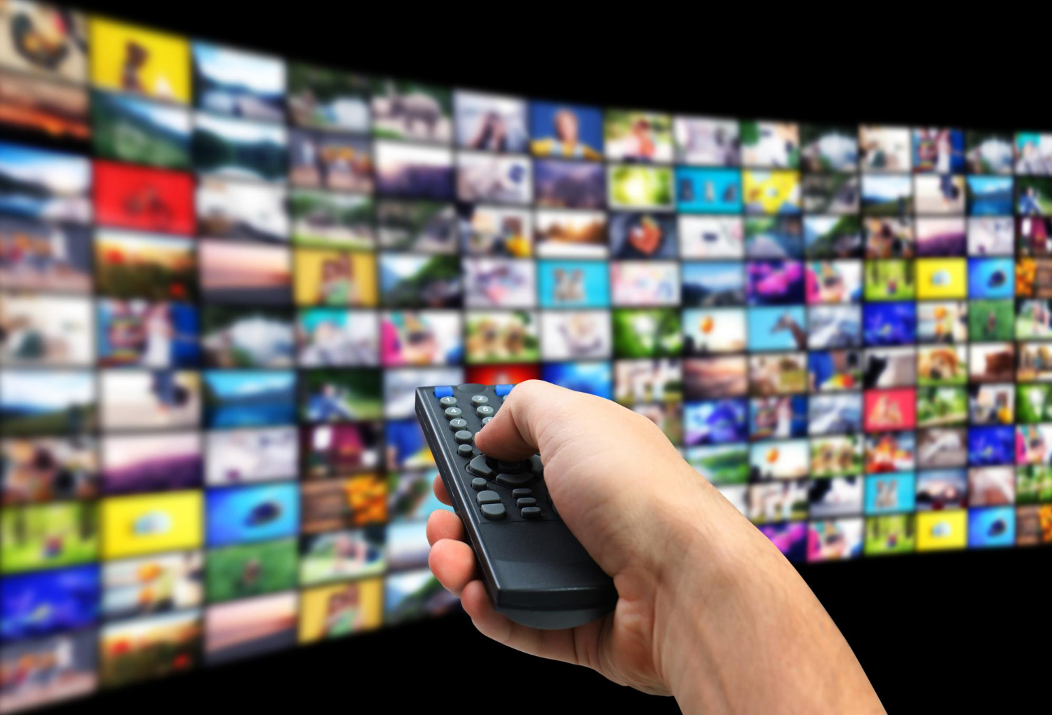 streaming-video-services-man-using-remote-control-change-channels-tv-closeup